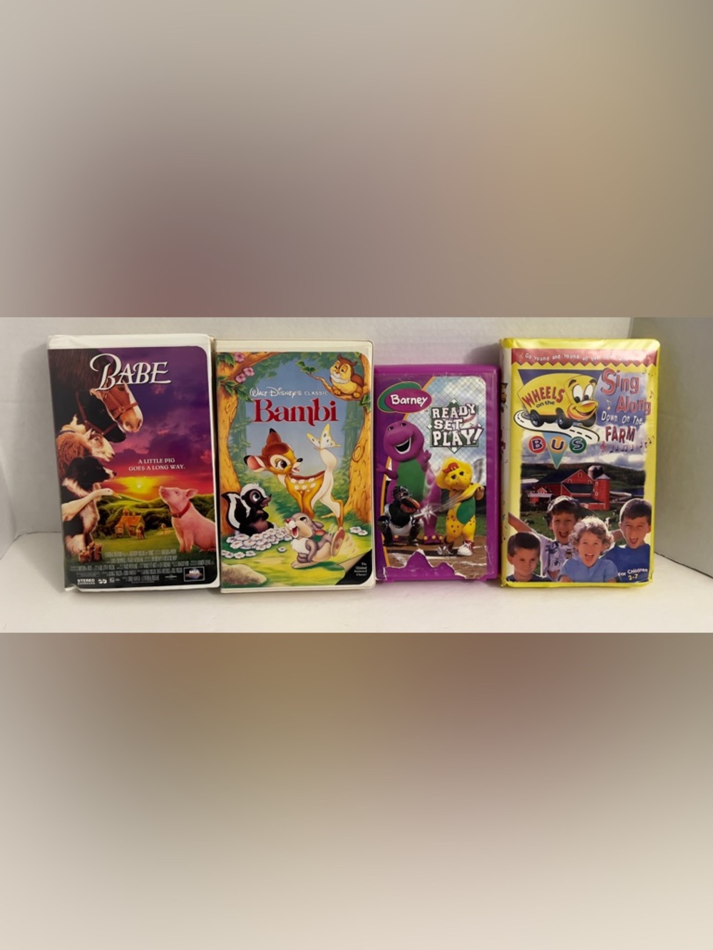 Kids VHS Tapes Set Of 4 Includes, BABE, Bambi, Barney & WHEELS ON THE BUS